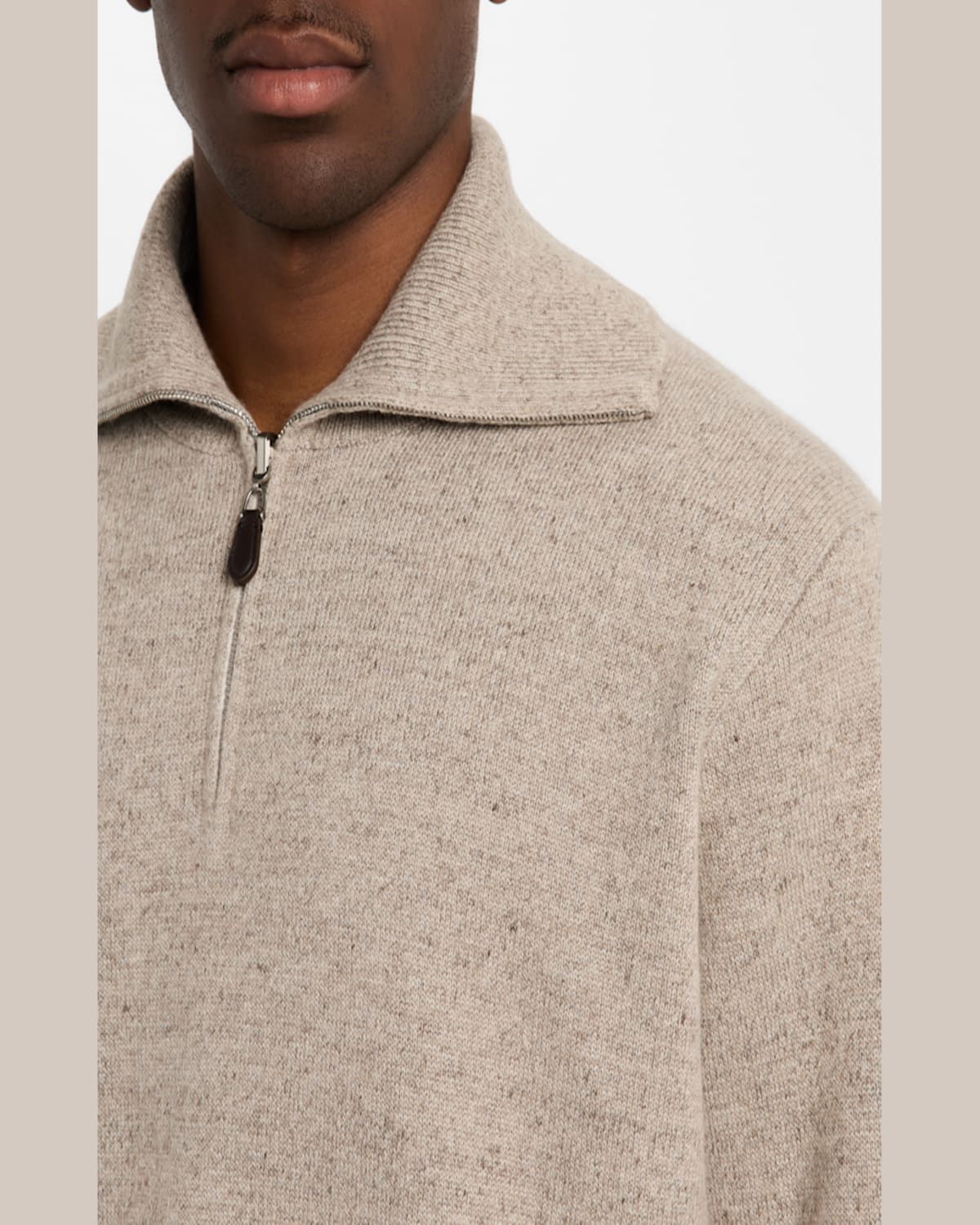 A close look at a soft oat knit and refined half-zip collar